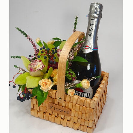 Flower basket with orchids and Martini champagne