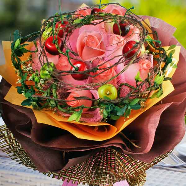 Peach Roses With Artificial Berry And  Twigs Special Hand Bouquet