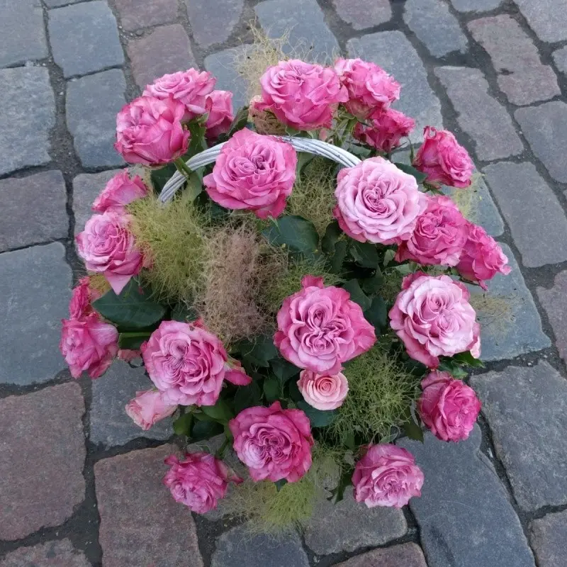 Pink roses in basket