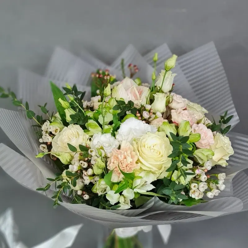 Bouquet of white flowers with roses