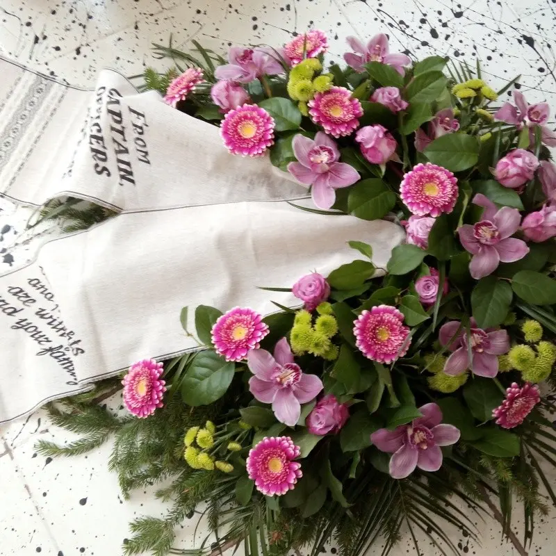 Memorial wreath with pink flowers
