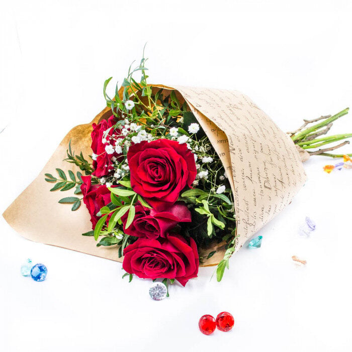 Red roses in the original craft envelope