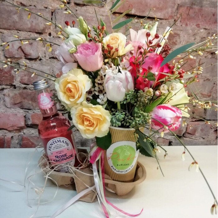 Flowers In A Cup With Lemonade