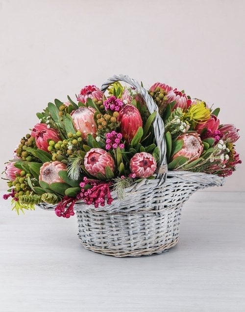 Stately Mixed Proteas In A Large Basket (Small)