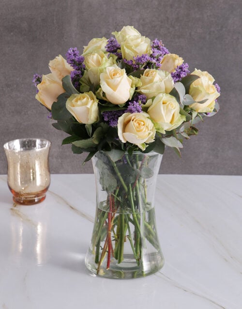 Cream Roses In Clear Vase
