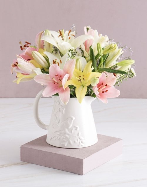 Pretty Lilies In Birdie Jug
