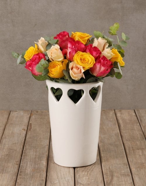 Vibrant Blooms In Cut Out Heart Vase