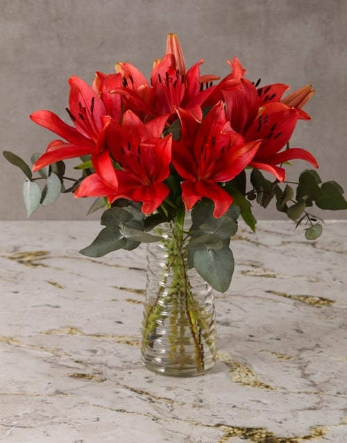 Breathtaking Red Lily Arrangement