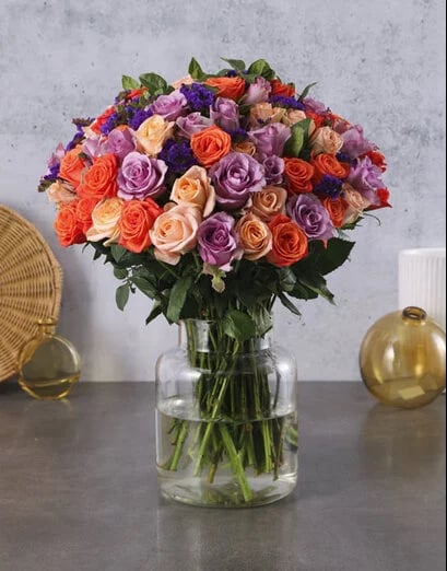Three Quarter Century Roses In Bell Vase