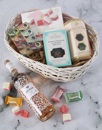 Elegant Rose And Gourmet Treats Basket