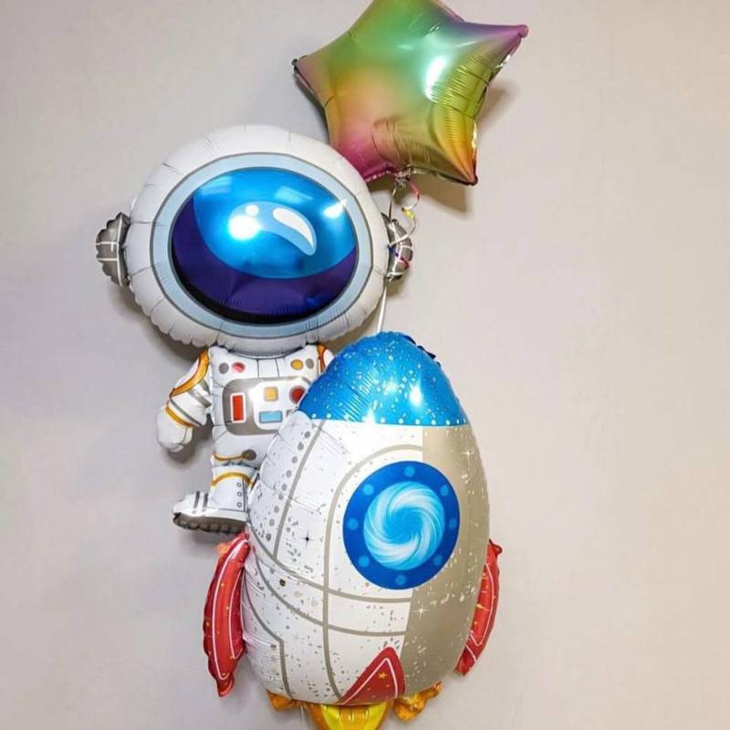 Who,is,the,cosmonaut,with,the,rocket?