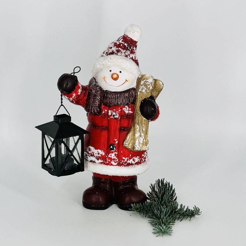 New,Year's,souvenir,candlestick,snowman,with,lantern