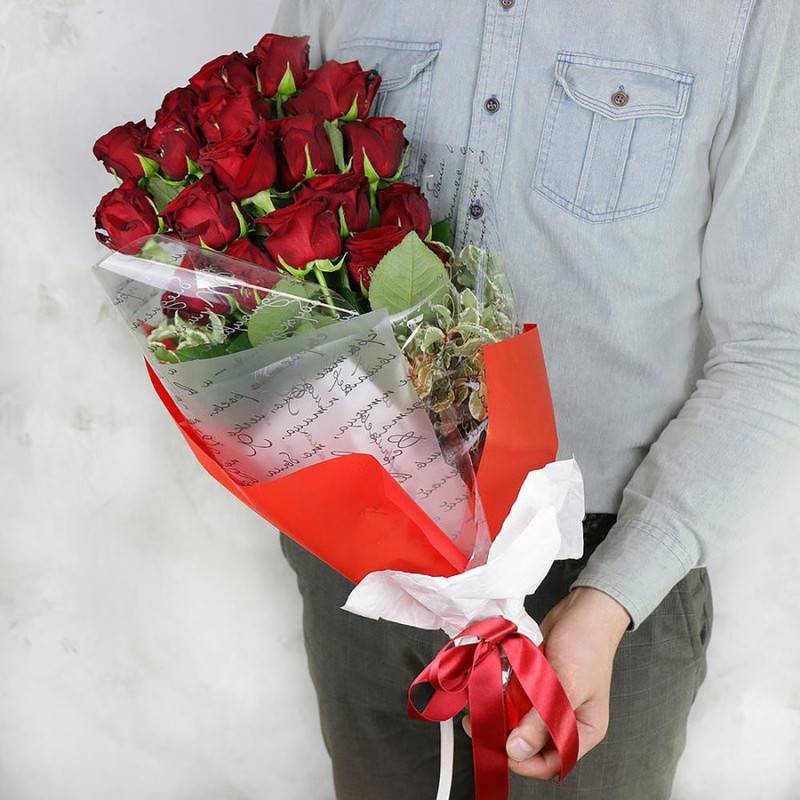 19,red,roses,with,pittosporum,in,bright,packaging