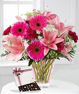 New Feelings (18 Gerbera Daises + 4 Liliesus)