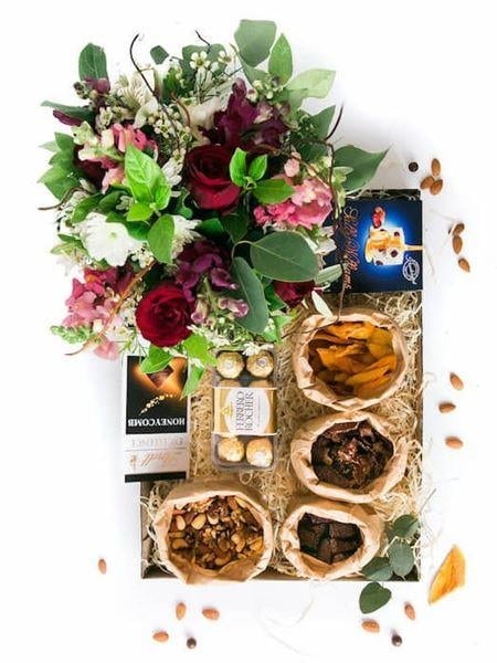 Decadent Jumbo Snack Box with Floral Arrangement