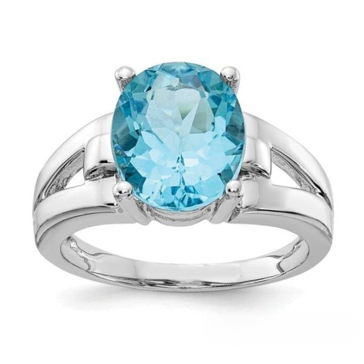 SILVER RING WITH OVAL TOPAZ STONE