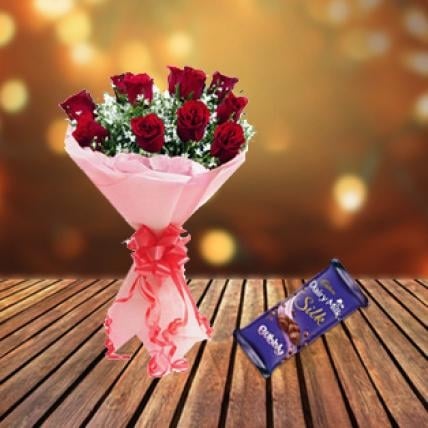 Roses & Dairy Milk Bubbly (12 Red Roses & 4 Cadbury Dairy Milk Bubbly (120 gm))