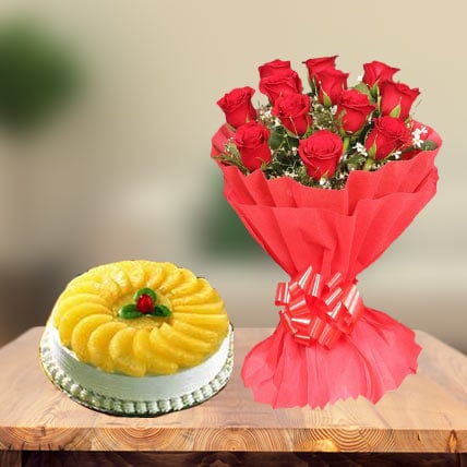 Premium Pineapple Cake and  Red Roses (1 Kg Cake & 12 Red Roses)