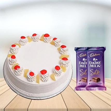 Pineapple Cake with Cadbury Silk Combo (1/2 kg Pineapple Cake With 5 Cadbury Dairy Milk Silk (60 gm))