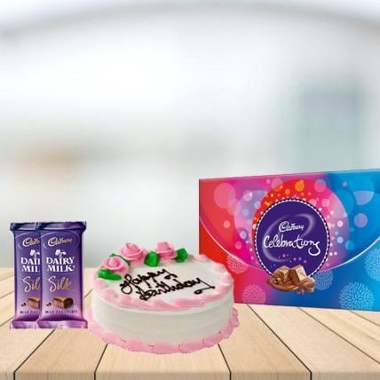Strawberry Cake with Assorted Chocolates Combo (1/2 kg Strawberry Cake With Cadbury Celebration and 3 Cadbury Dairy Milk Silk (60 gm))