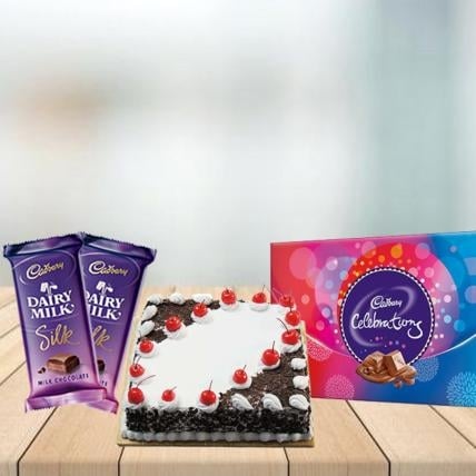 Square Black Forest Cake with Assorted Chocolates Combo (1/2 kg Square Black Forest Cake With Cadbury Celebration and 3 Cadbury Dairy Milk Silk (60 gm))