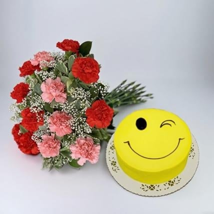Perfect Combination (1 Kg Smiley Cake with 18 Carnations)