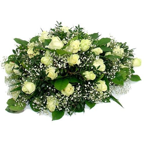 Funeral arrangement white roses