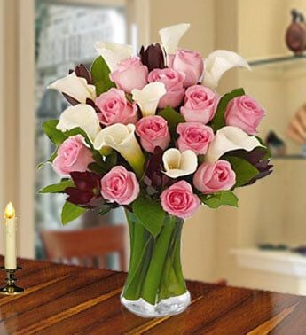 Ideal Moment (12 Pink Roses , 10 White calla Lilies)