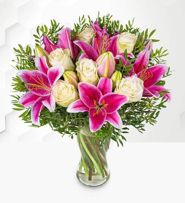 Pink lily and white roses