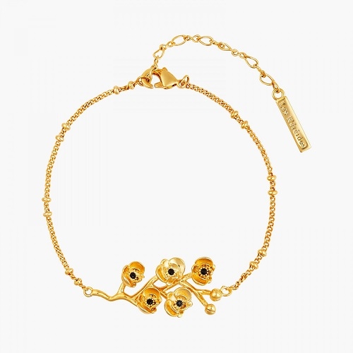 FLAMBOYANT ORCHID & BRANCH WITH CUT CRYSTAL HEART BRACELET