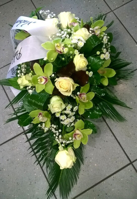 Funeral arrangement: white roses and orchids