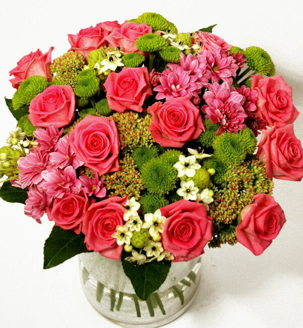 Bouquet of pink roses and green chrysanthemums