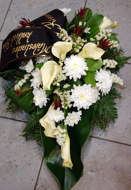 Funeral arrangement - white callas and chrysanthemums