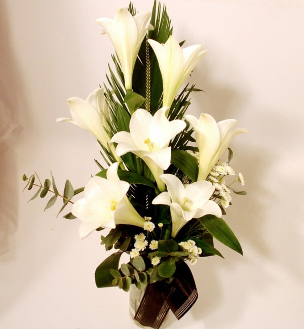 Handtied bouquet of white lilies