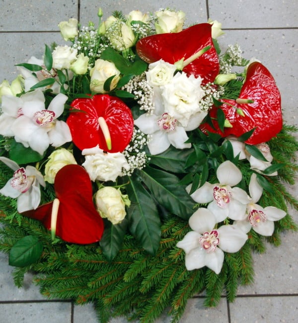 Funeral wreath: red anthuriums, white roses and orchids