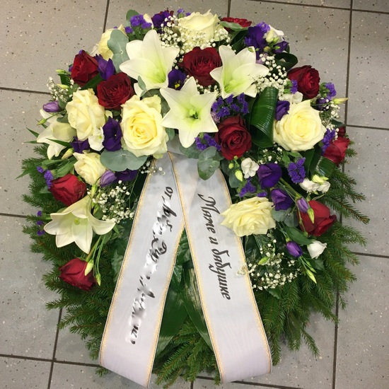 Wreath: White lilacs, white and red roses, lilac irises and lilacs