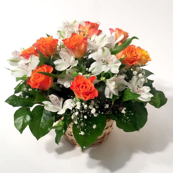 Flower arrangement with orange roses, inkaliya and gypsum (11 Roses)