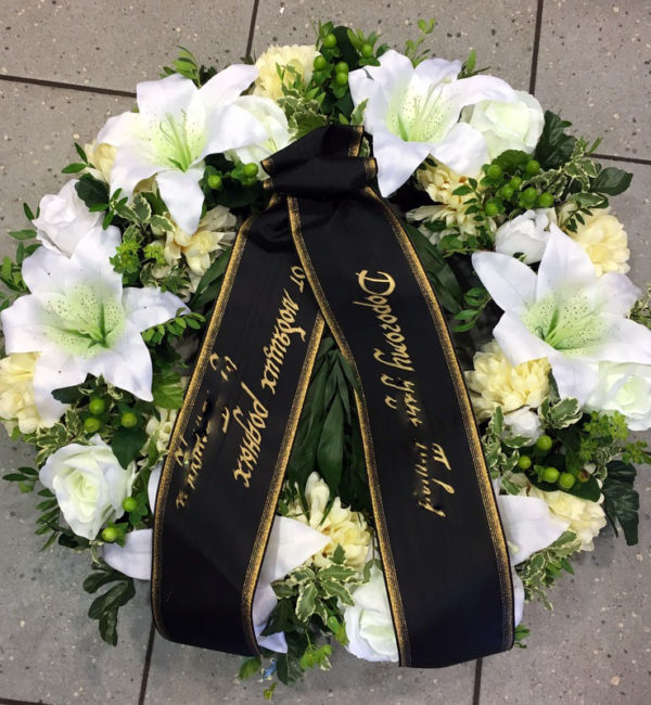 Funeral wreath with artificial flowers