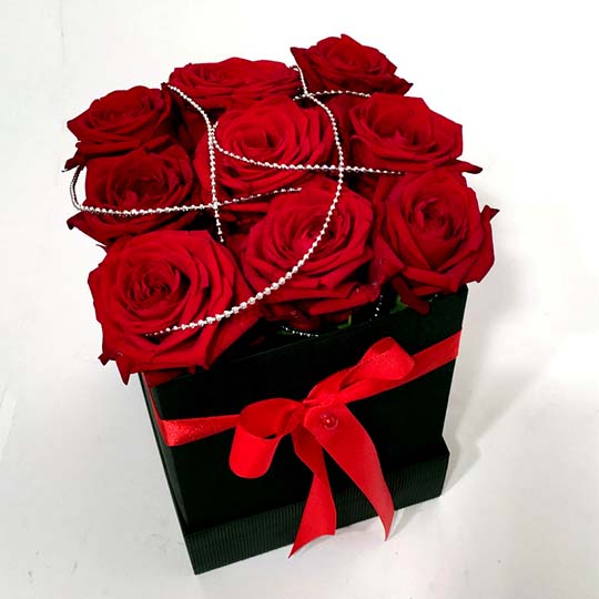 Stylish giftbox with red roses