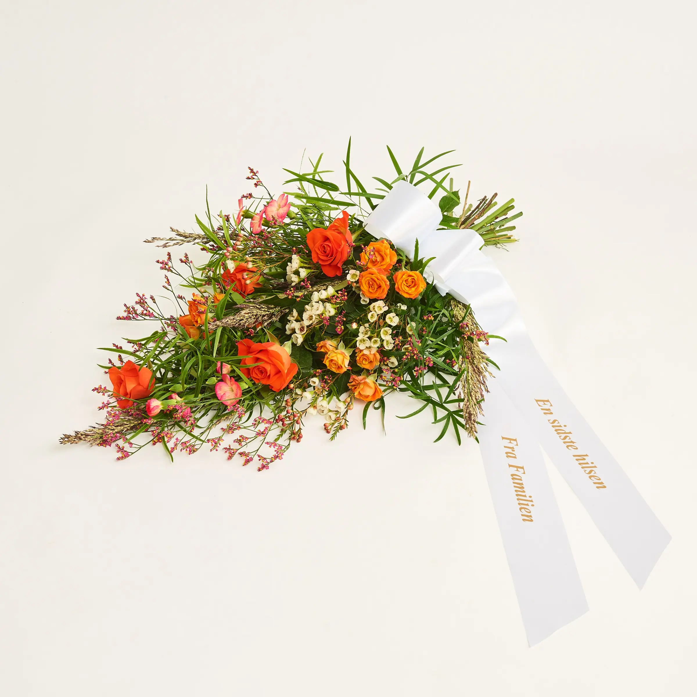 Funeral spray golden with ribbon