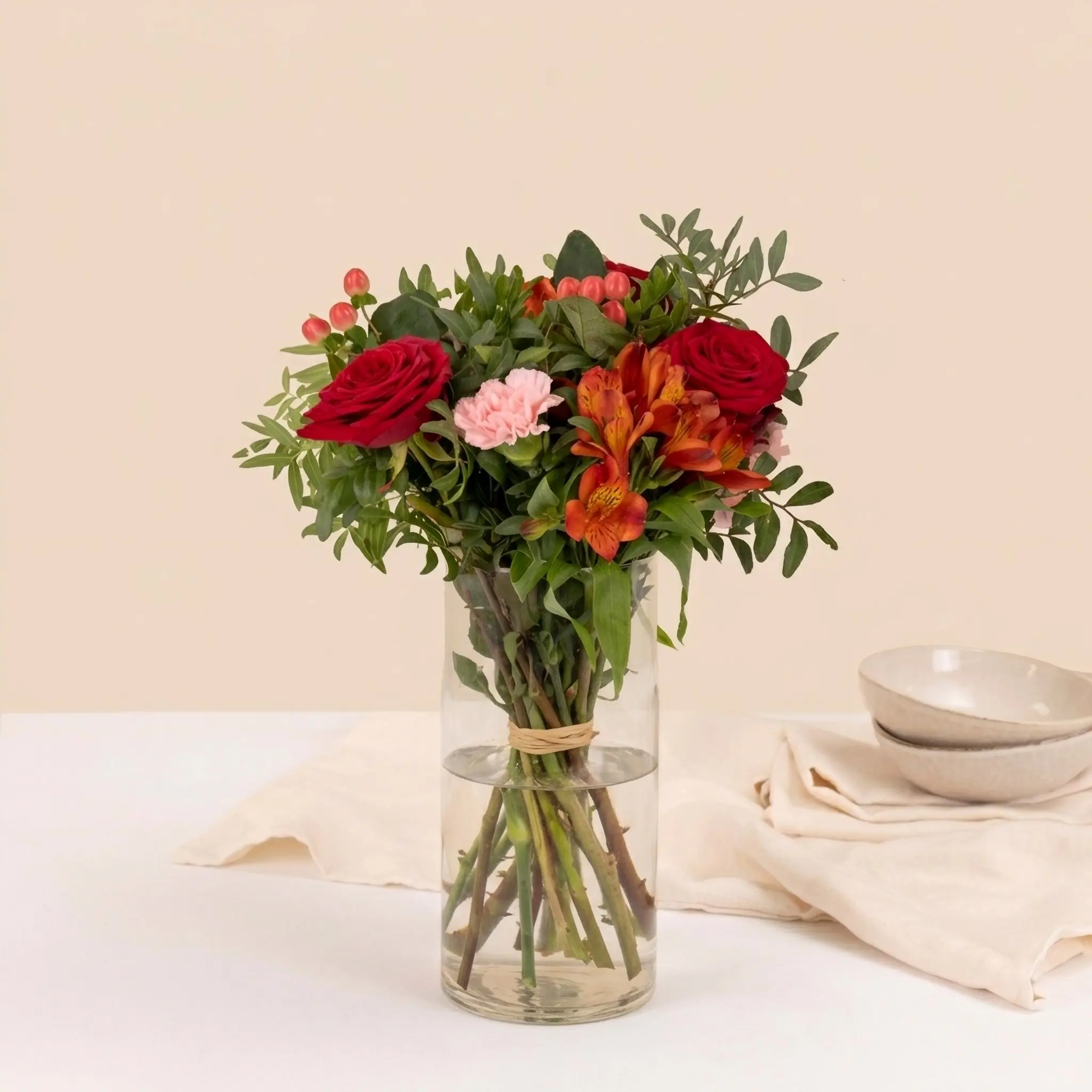 Mixed bouquet of warm orange and red tones