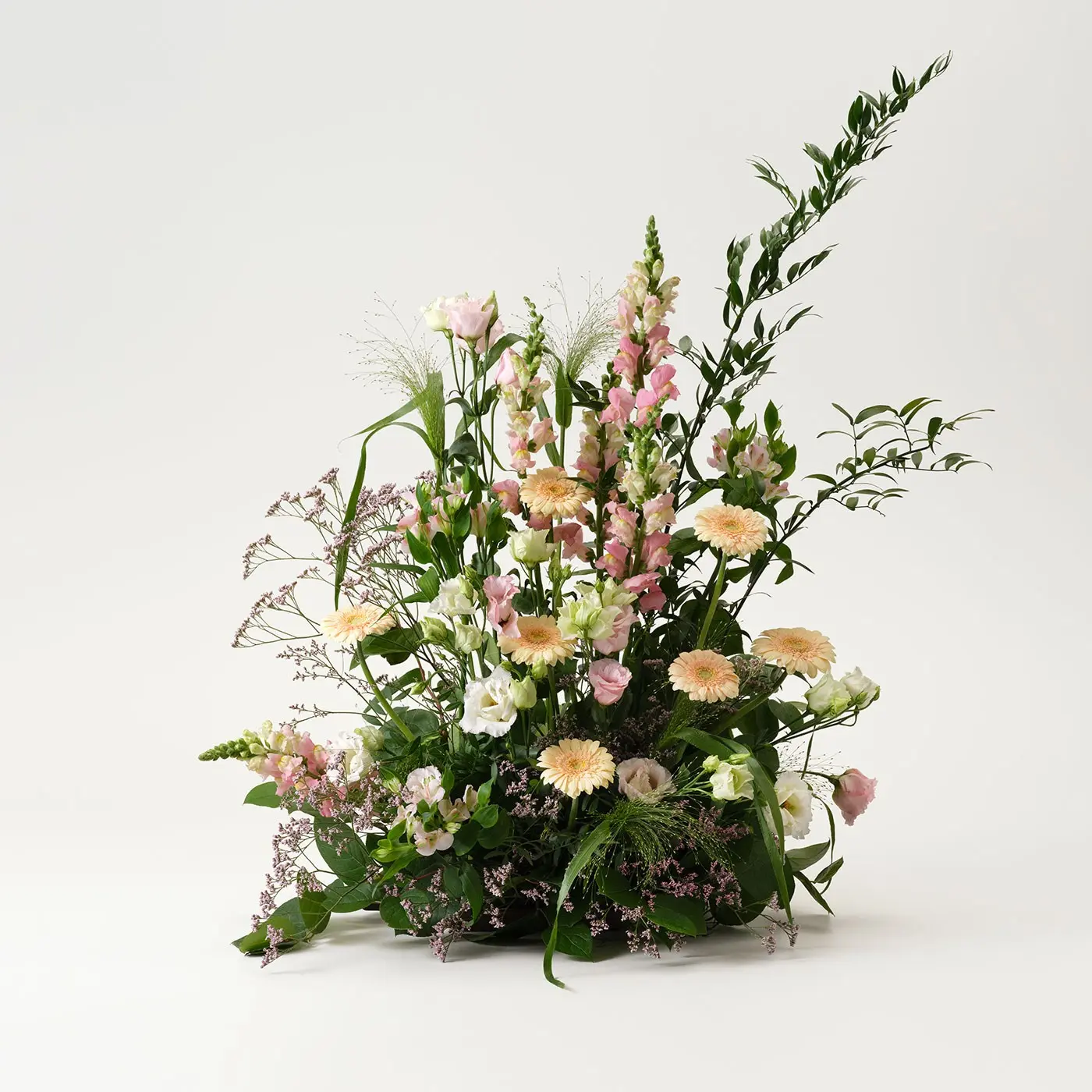Funeral arrangement in pink