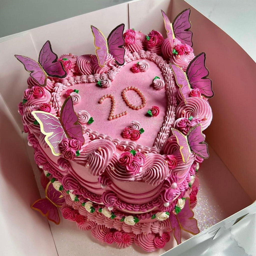 Elegantly Piped Heart Shaped butterfly Cake