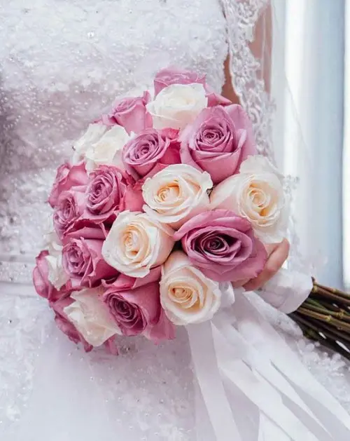 https://cdn11.bigcommerce.com/s-s00dfko9/images/stencil/{:size}/products/297/2192/Ecuadorian_Mixed_Roses_Bridal_Bouquet__48243.1673458426.jpg?c=2
