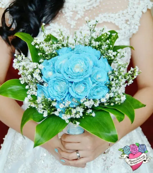 https://cdn11.bigcommerce.com/s-s00dfko9/images/stencil/{:size}/products/164/1917/bridal_bouquet_blue_roses_manila__07719.1599445070.jpg?c=2