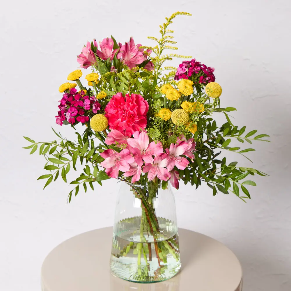 A mood-boosting bouquet of yellow and pink flowers