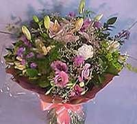 Bouquet of liliums and alstromerias or lisianthus