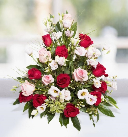 Flower Arrangement Of Red And Pink Roses