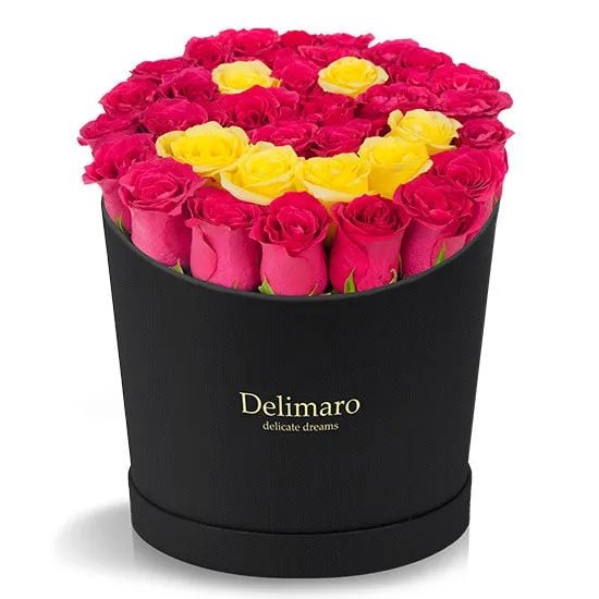 Red roses in a black box