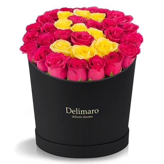 Red roses in a black box